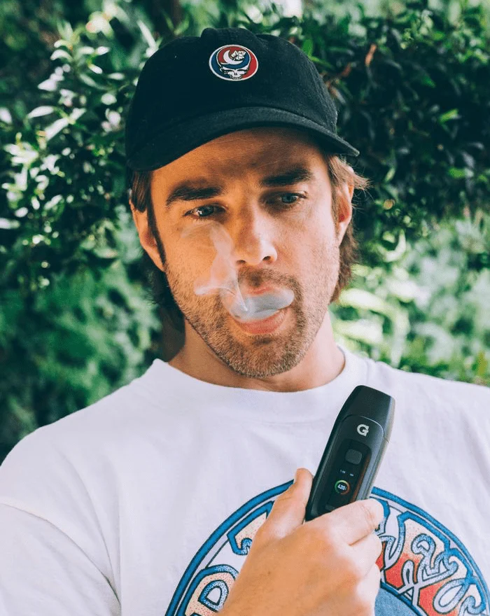 G Pen Dash+ dry herb vaporizer in use