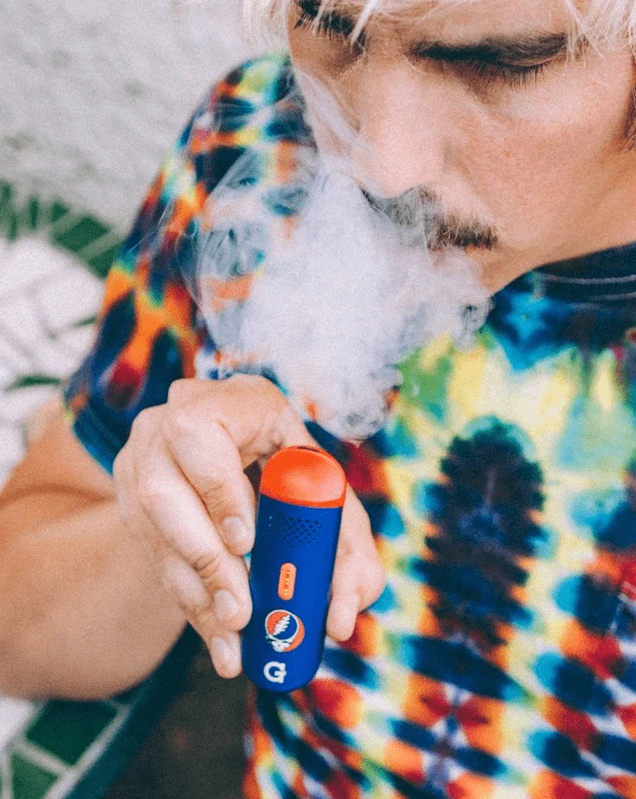 Grateful Dead x G Pen Dash vaporizer in use