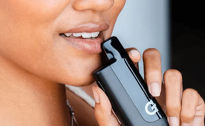 G Pen Hydout held to the lips