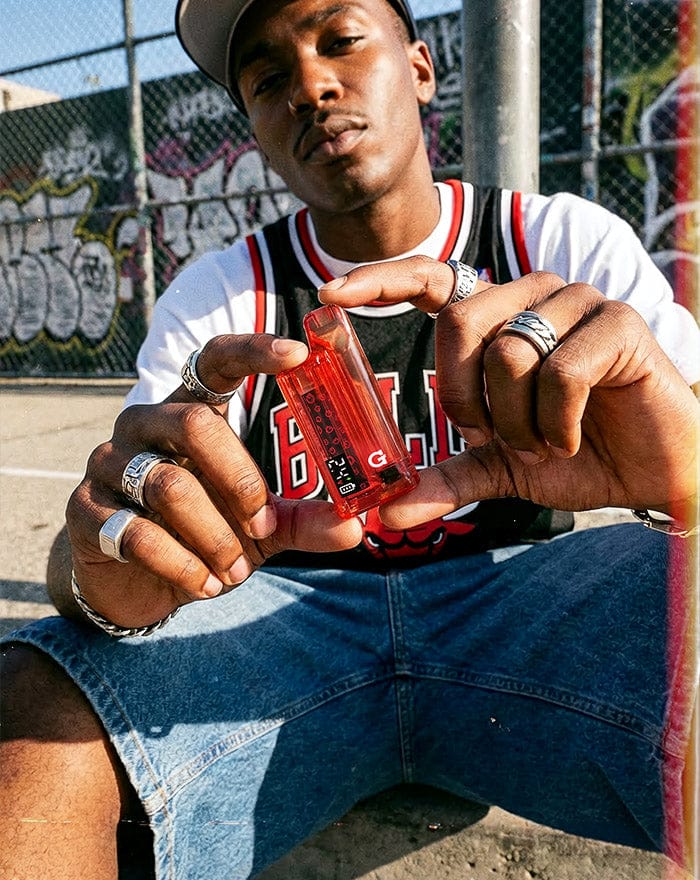 Holding the Red Translucent G Pen Hydout